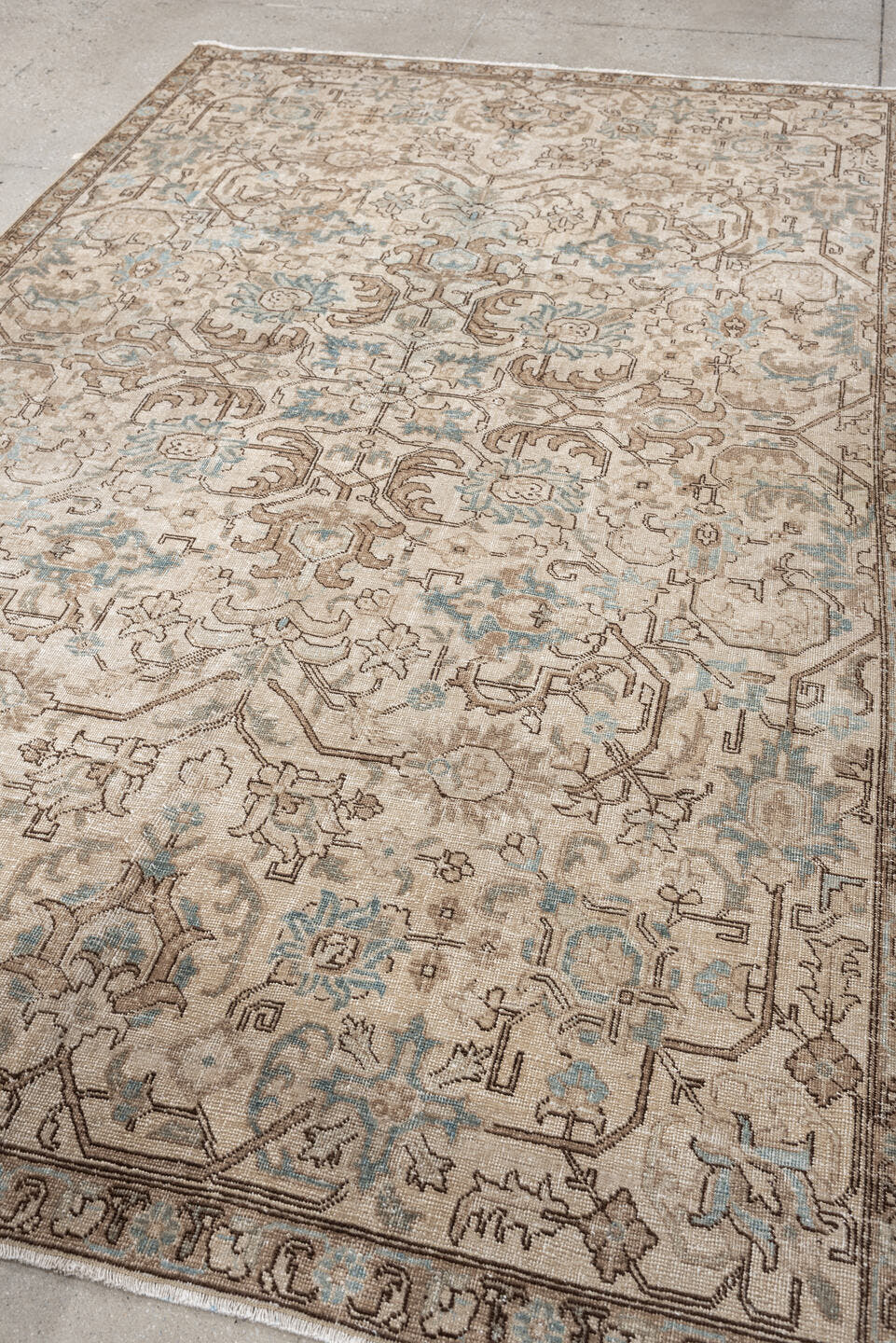 5' x 8' one-of-a-kind handmade antique Tabriz medium size rug. Color palette: ivory, taupe, pale blue, camel, light brown