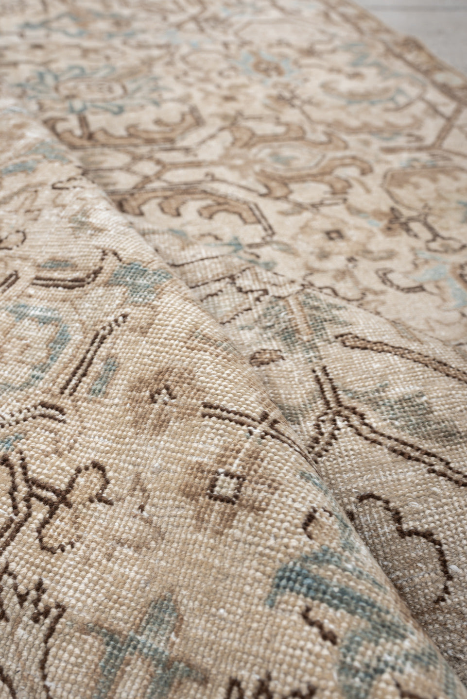 5' x 8' one-of-a-kind handmade antique Tabriz medium size rug. Color palette: ivory, taupe, pale blue, camel, light brown