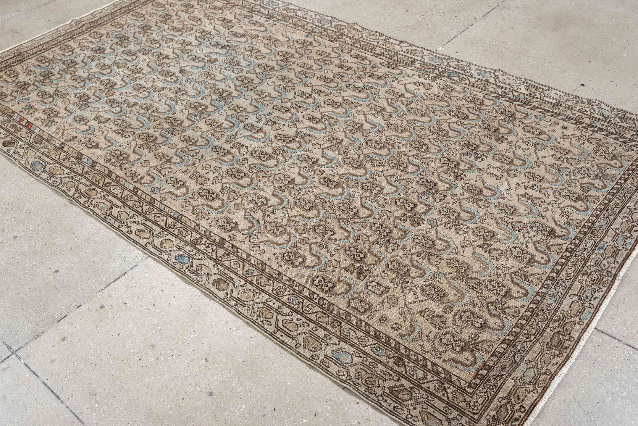 4' x 8' one-of-a-kind handmade antique Malayer medium size rug. Color palette: ivory, taupe, brown, sky blue, camel, rust