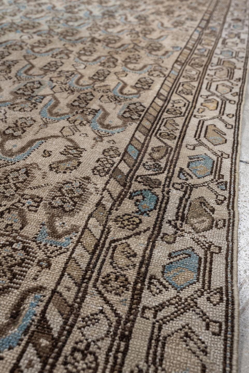 4' x 8' one-of-a-kind handmade antique Malayer medium size rug. Color palette: ivory, taupe, brown, sky blue, camel, rust