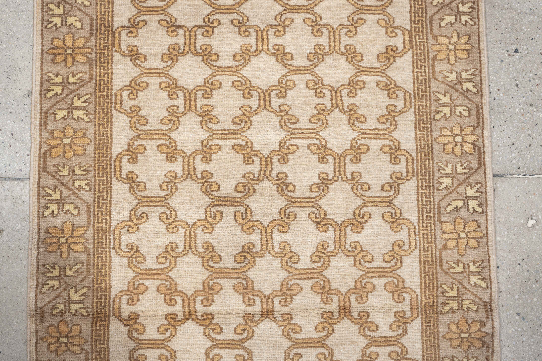 2' x 10' one-of-a-kind handmade antique Khotan runner rug. Color palette: ivory, taupe, beige, pale peach, camel, gray