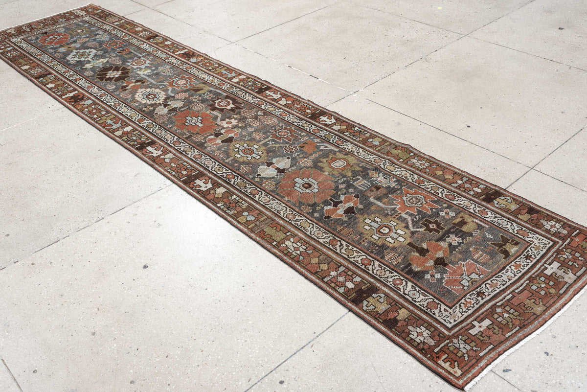 2' x 12' one-of-a-kind handmade antique NW Persian runner rug. Color palette: slate blue, rust, ivory, charcoal, dark brown