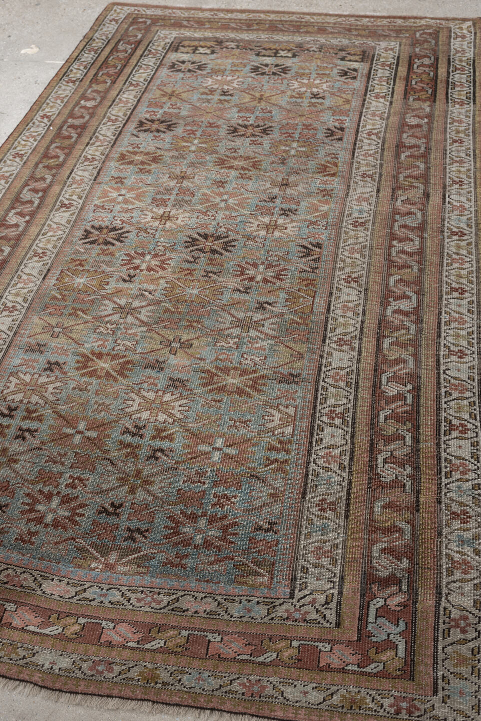 4' x 7' one-of-a-kind handmade antique Bidjar rug. Color palette: pale blue, rust, ivory, camel, taupe, brown, charcoal