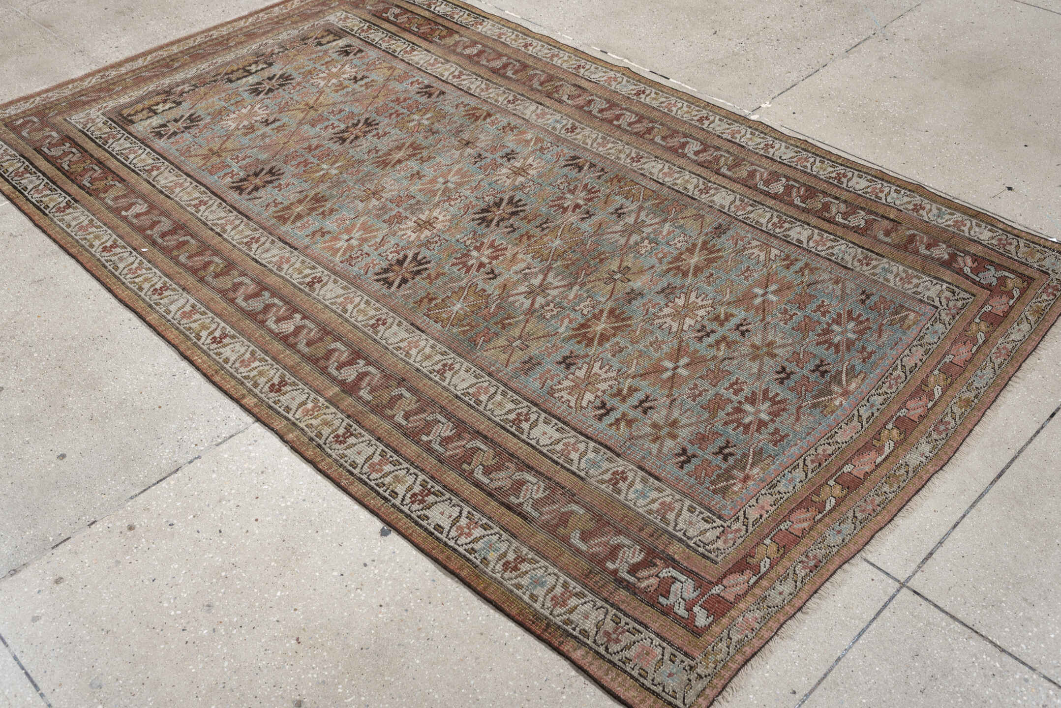 4' x 7' one-of-a-kind handmade antique Bidjar rug. Color palette: pale blue, rust, ivory, camel, taupe, brown, charcoal
