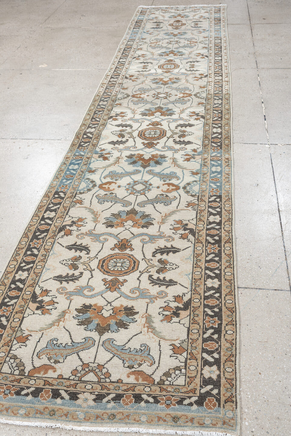 2' x 13' one-of-a-kind handmade antique Tabriz runner rug. Color palette: ivory, sky blue, camel, charcoal, taupe, slate