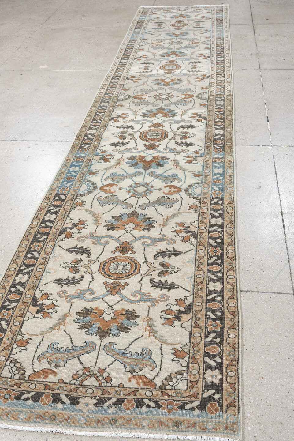 2' x 13' one-of-a-kind handmade antique Tabriz runner rug. Color palette: ivory, sky blue, camel, charcoal, taupe, slate