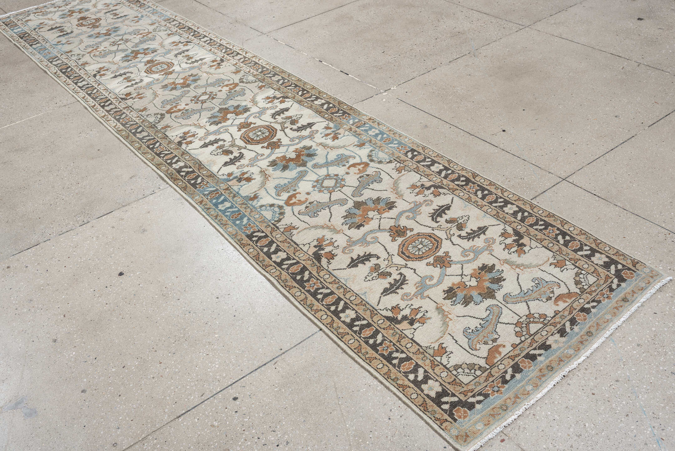 2' x 13' one-of-a-kind handmade antique Tabriz runner rug. Color palette: ivory, sky blue, camel, charcoal, taupe, slate