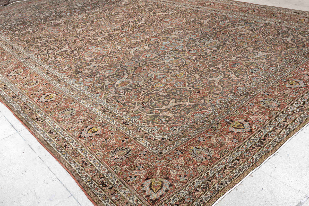 22' x 13' one-of-a-kind handmade antique Baktiary oversize rug. Color palette: charcoal, terracotta, ivory, teal, sage, gold