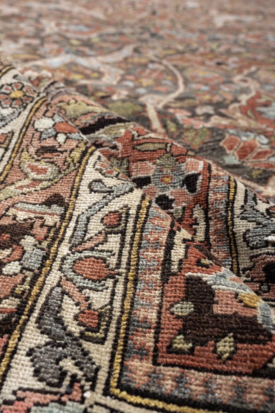 22' x 13' one-of-a-kind handmade antique Baktiary oversize rug. Color palette: charcoal, terracotta, ivory, teal, sage, gold
