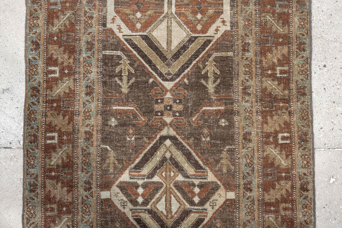 2' x 10' one-of-a-kind handmade antique Saraband runner rug. Color palette: charcoal, rust, ivory, camel, muted teal, taupe