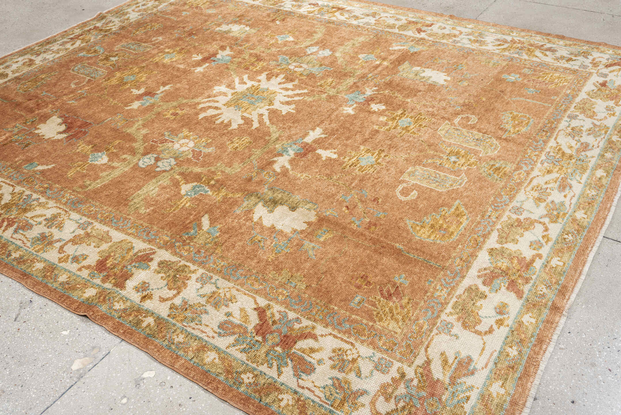 8' x 9' one-of-a-kind handmade antique Oushak large size rug. Color palette: terra cotta, ivory, sage, light blue, gold
