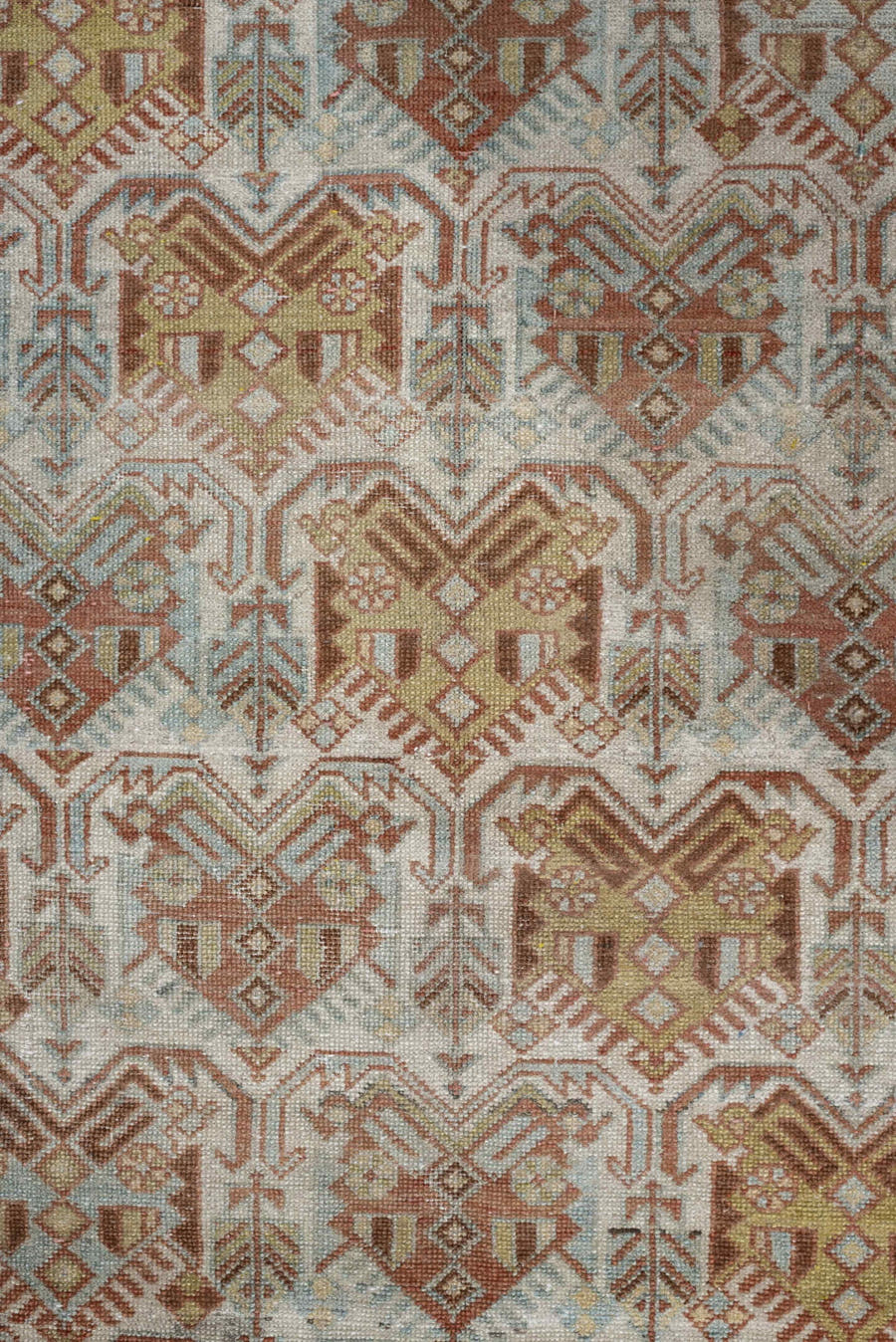 4' x 5' one-of-a-kind handmade antique Afshar small size rug. Color palette: ivory, terra cotta, pale blue, camel, taupe