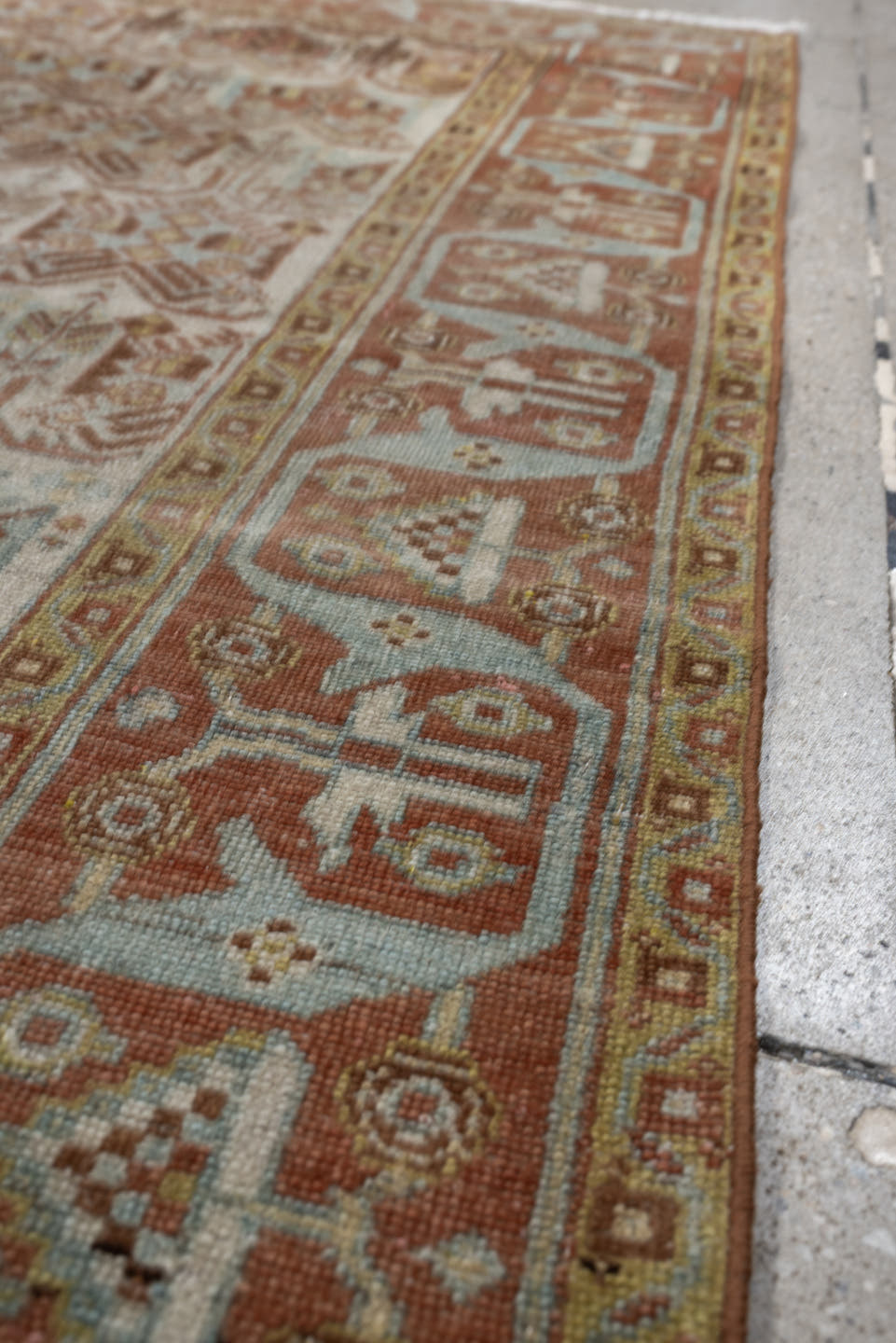 4' x 5' one-of-a-kind handmade antique Afshar small size rug. Color palette: ivory, terra cotta, pale blue, camel, taupe