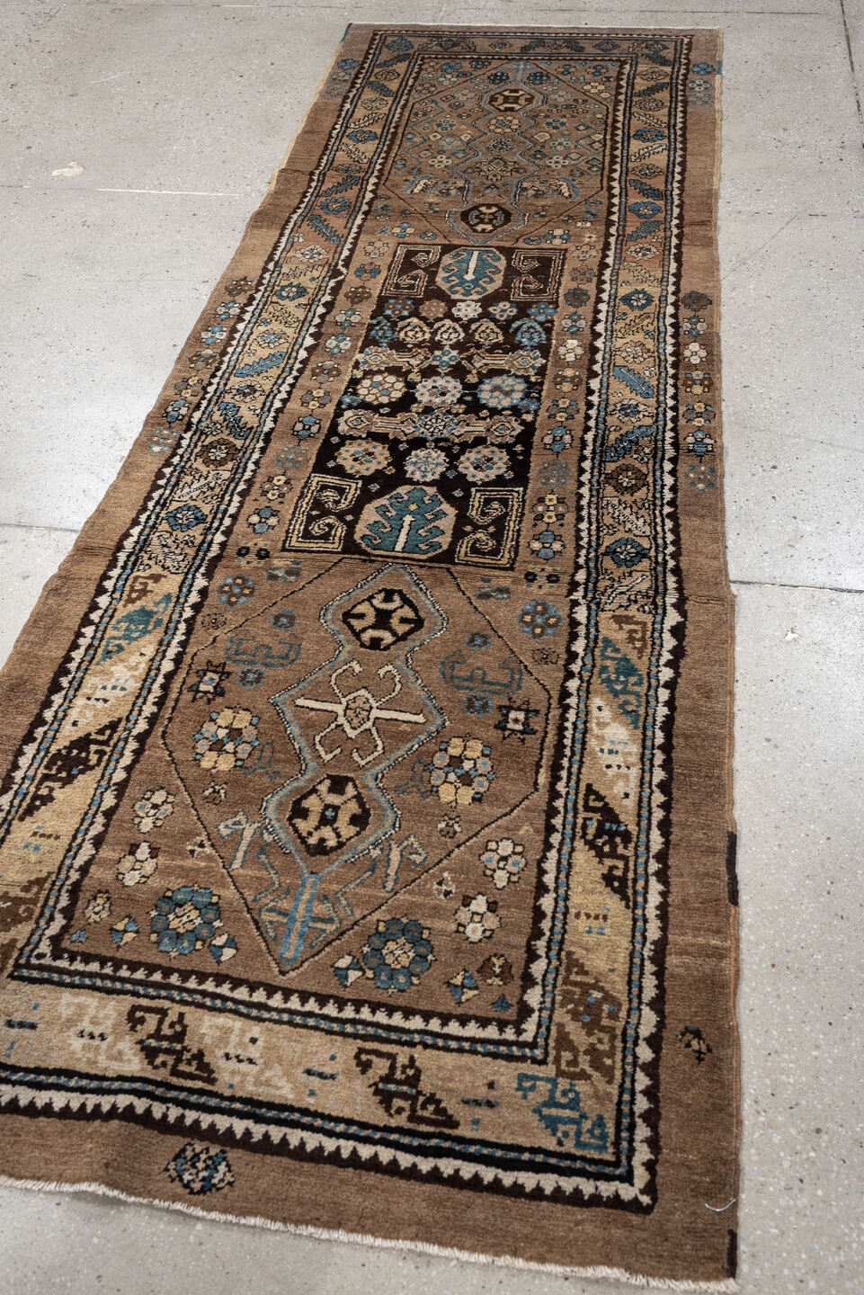 2' x 8' one-of-a-kind handmade antique Sarab runner rug. Color palette: camel, taupe, ivory, brown, sky blue, charcoal
