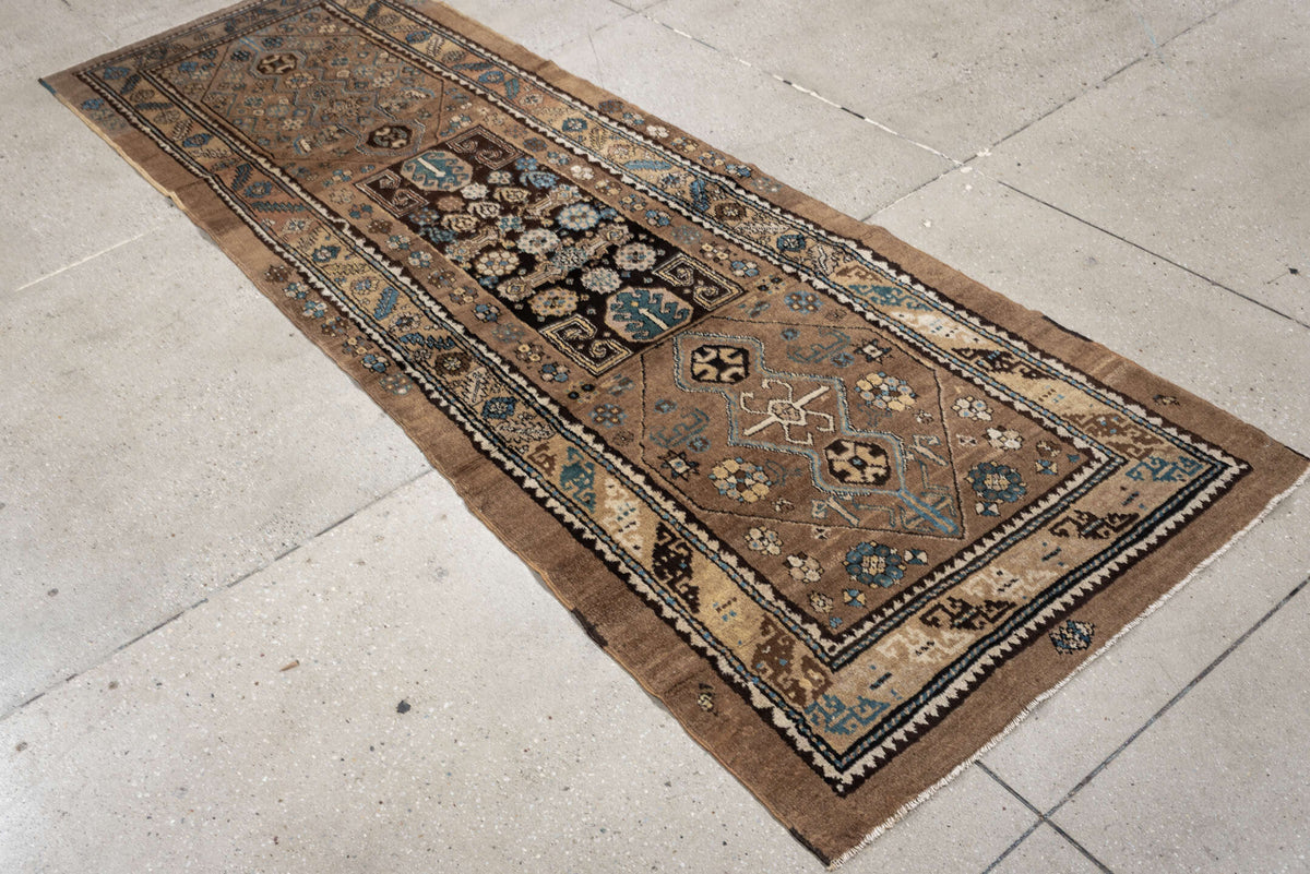 2' x 8' one-of-a-kind handmade antique Sarab runner rug. Color palette: camel, taupe, ivory, brown, sky blue, charcoal