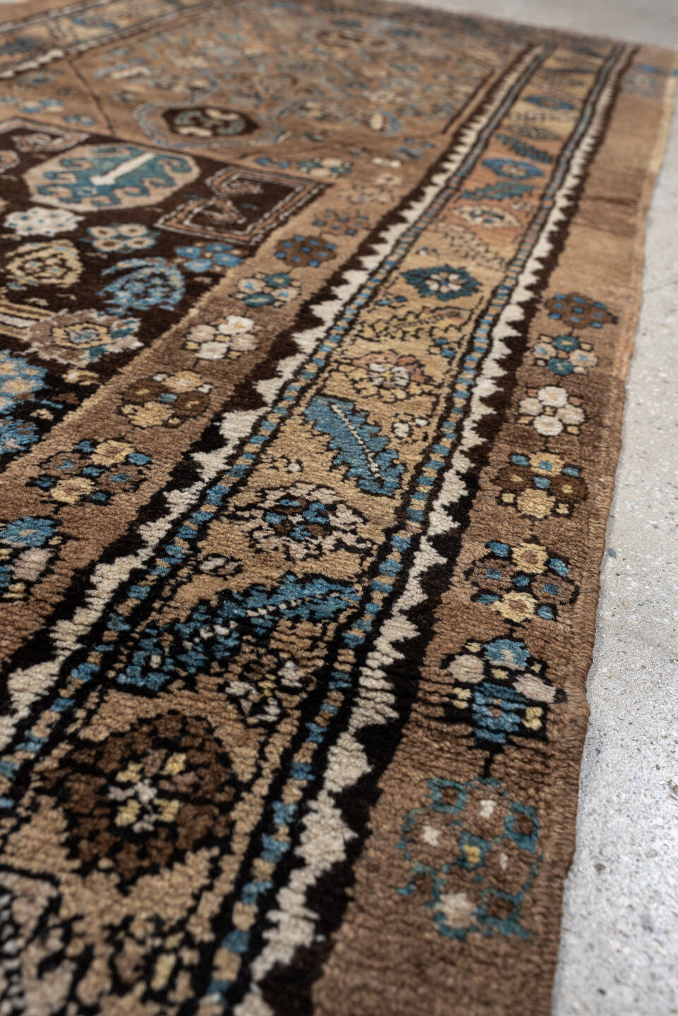 2' x 8' one-of-a-kind handmade antique Sarab runner rug. Color palette: camel, taupe, ivory, brown, sky blue, charcoal