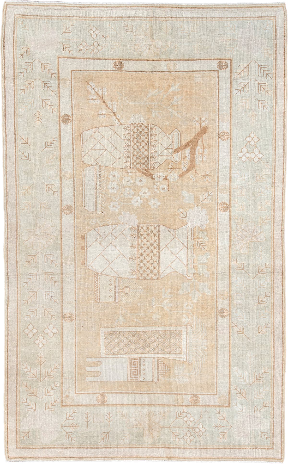 5' x 9' one-of-a-kind handmade antique Khotan medium size rug. Color palette: ivory, sand, celadon, beige, taupe, camel
