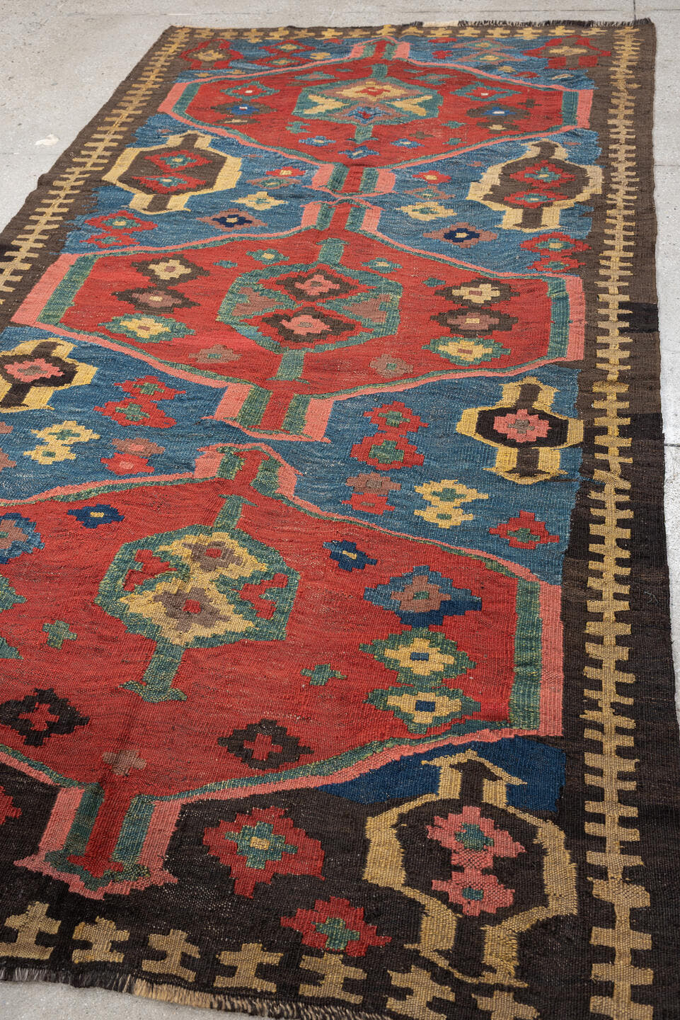 4' x 9' one-of-a-kind handmade antique Kilim medium size rug. Color palette: rust, blue, ivory, charcoal, rose, olive, teal