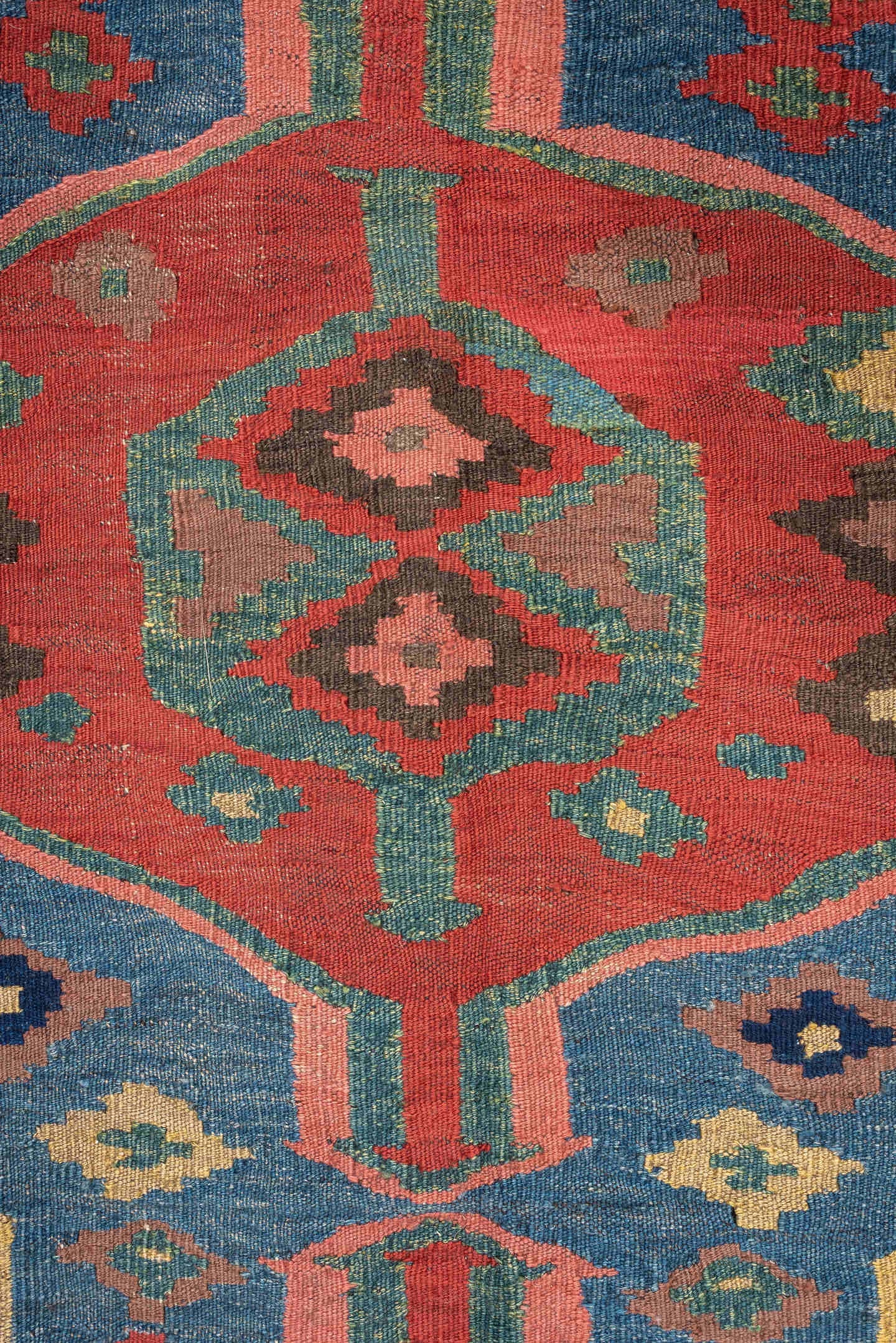 4' x 9' one-of-a-kind handmade antique Kilim medium size rug. Color palette: rust, blue, ivory, charcoal, rose, olive, teal