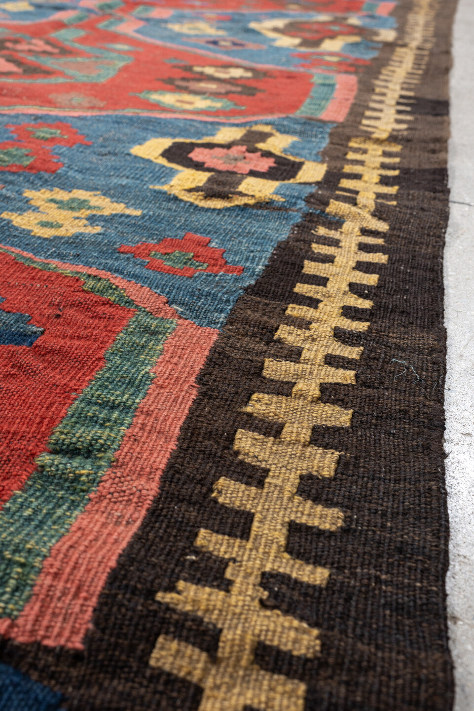 4' x 9' one-of-a-kind handmade antique Kilim medium size rug. Color palette: rust, blue, ivory, charcoal, rose, olive, teal