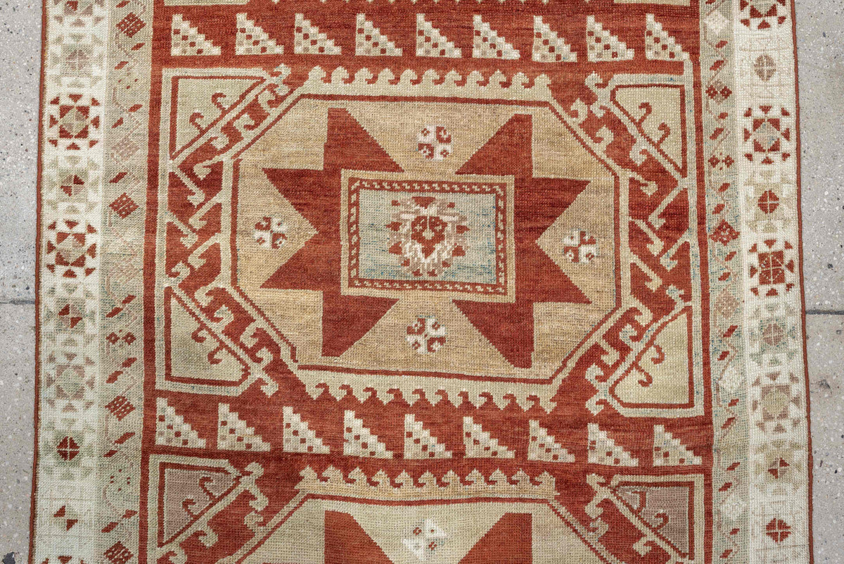 3' x 10' one-of-a-kind handmade vintage Caucasian runner rug. Color palette: ivory, terracotta, rust, blue gray, taupe