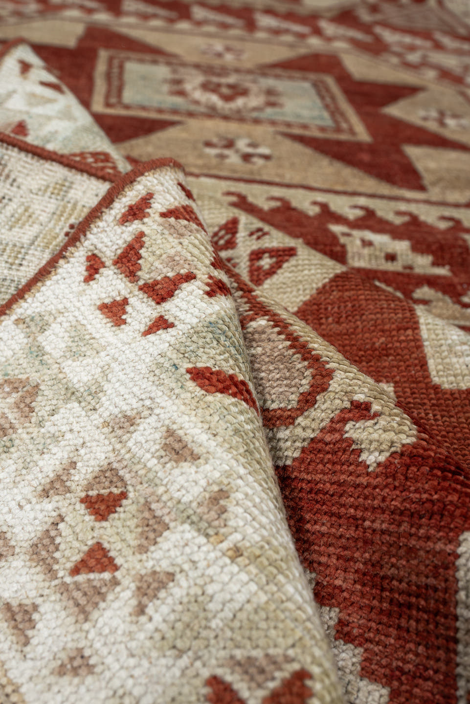 3' x 10' one-of-a-kind handmade vintage Caucasian runner rug. Color palette: ivory, terracotta, rust, blue gray, taupe
