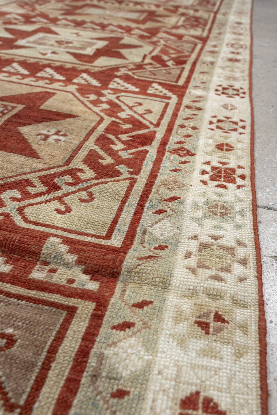 3' x 10' one-of-a-kind handmade vintage Caucasian runner rug. Color palette: ivory, terracotta, rust, blue gray, taupe
