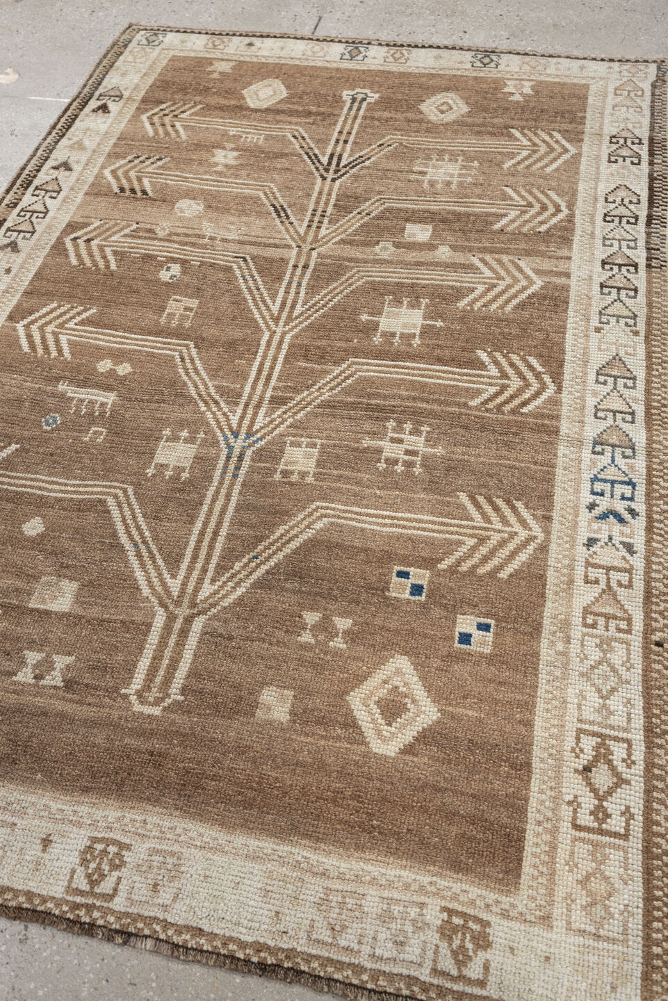 4' x 6' one-of-a-kind handmade antique Gabbeh small size rug. Color palette: camel, ivory, taupe, brown, charcoal, blue