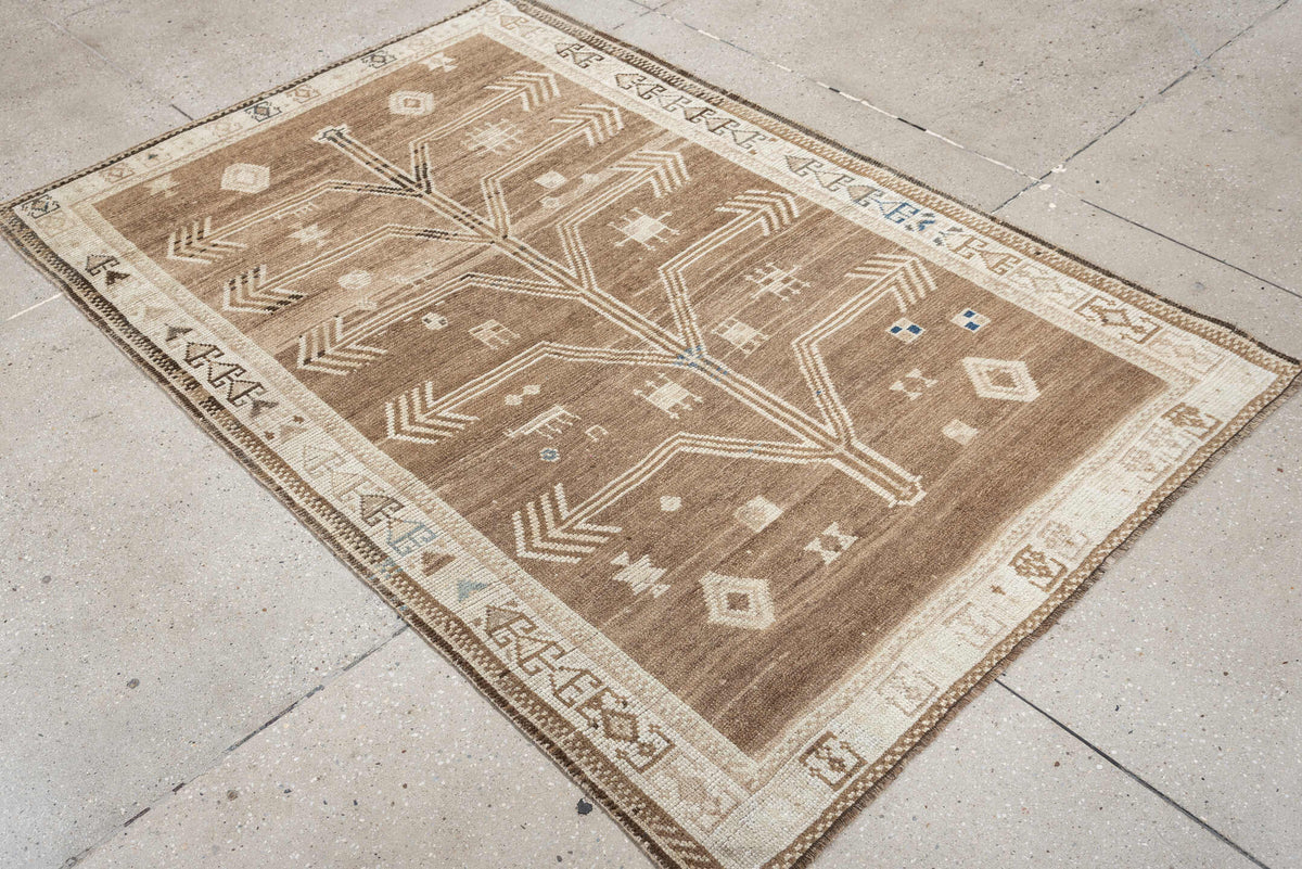 4' x 6' one-of-a-kind handmade antique Gabbeh small size rug. Color palette: camel, ivory, taupe, brown, charcoal, blue