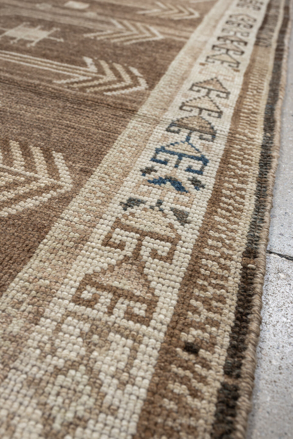 4' x 6' one-of-a-kind handmade antique Gabbeh small size rug. Color palette: camel, ivory, taupe, brown, charcoal, blue
