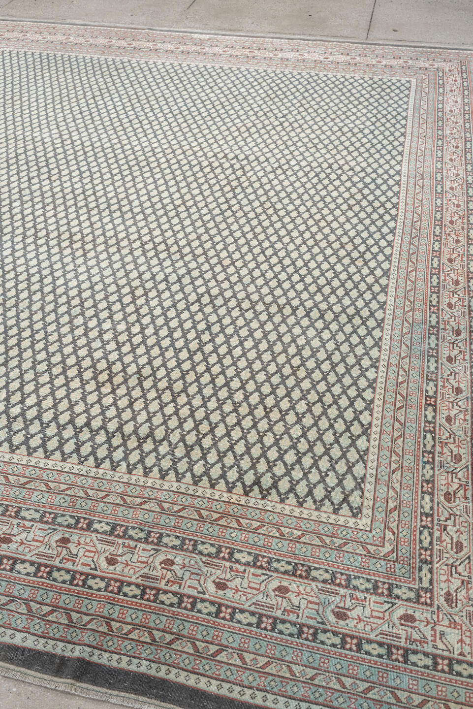 8' x 9' one-of-a-kind handmade antique Mir large size rug. Color palette: ivory, pale blue, rust, charcoal, taupe
