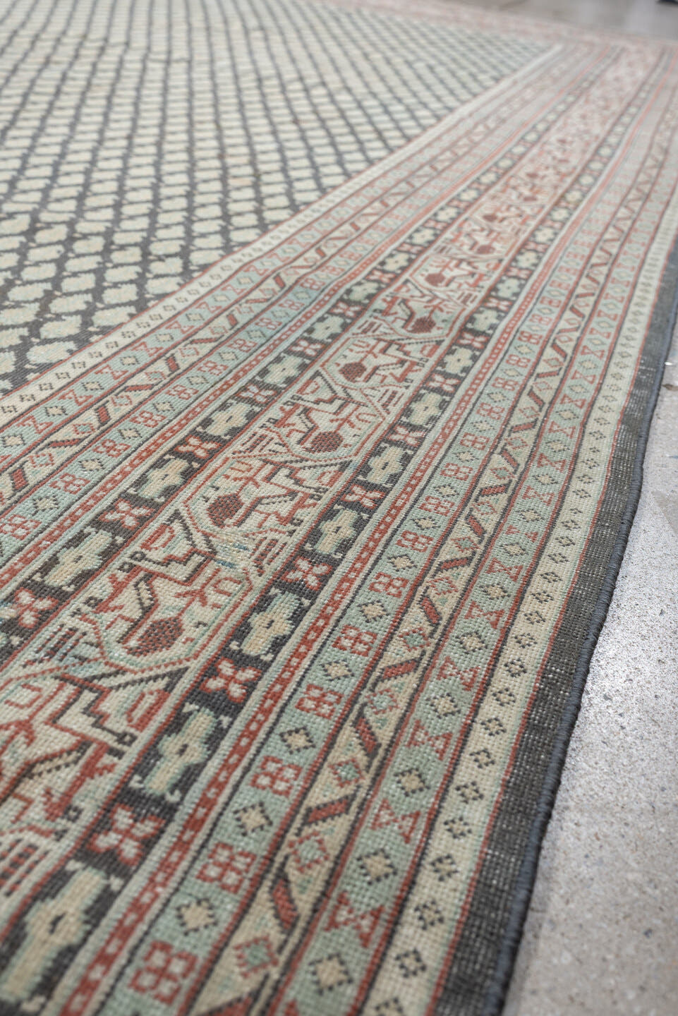 8' x 9' one-of-a-kind handmade antique Mir large size rug. Color palette: ivory, pale blue, rust, charcoal, taupe