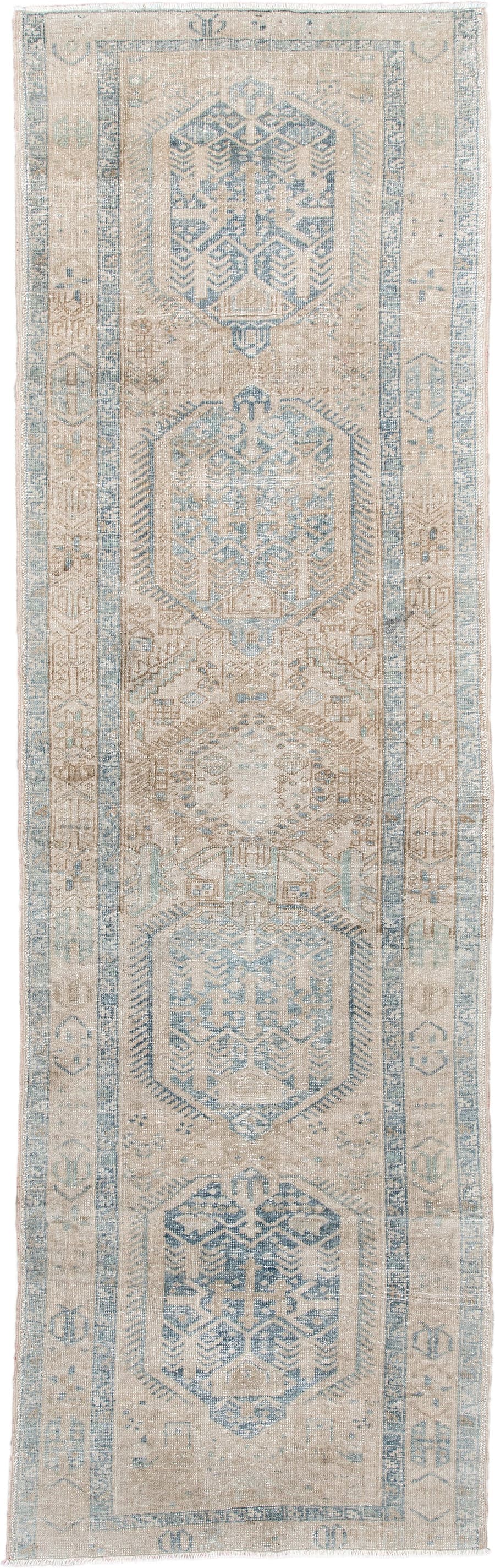 3' x 11' one-of-a-kind handmade antique Heriz runner rug. Color palette: ivory, pale blue, beige, taupe, camel, light blue