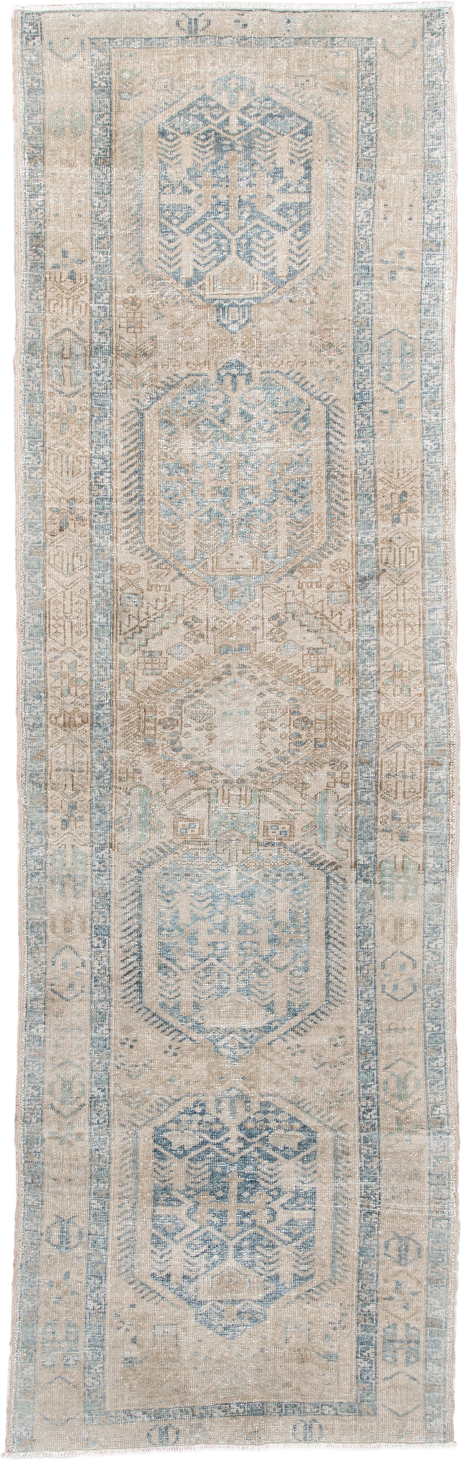 3' x 11' one-of-a-kind handmade antique Heriz runner rug. Color palette: ivory, pale blue, beige, taupe, camel, light blue