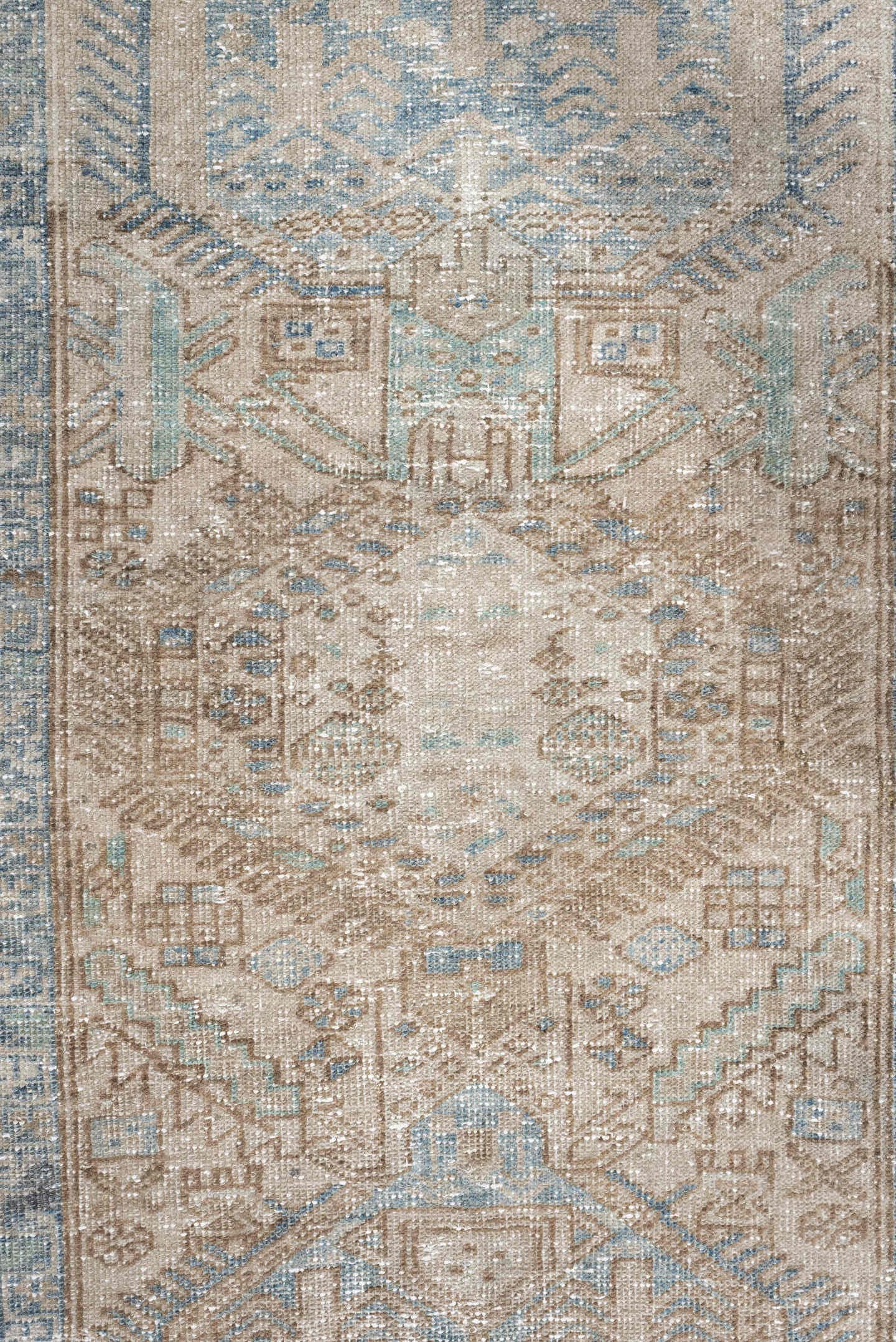 3' x 11' one-of-a-kind handmade antique Heriz runner rug. Color palette: ivory, pale blue, beige, taupe, camel, light blue