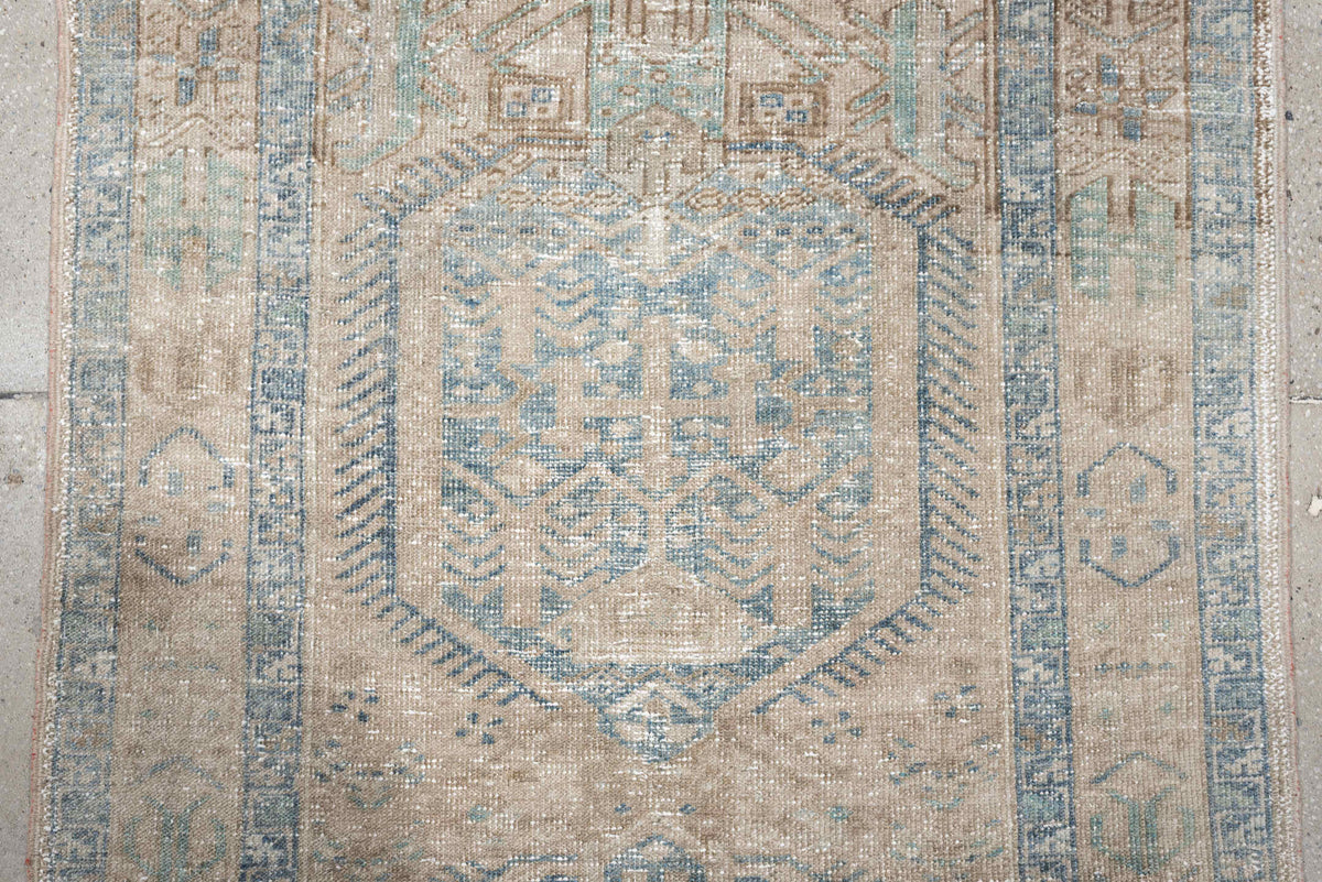 3' x 11' one-of-a-kind handmade antique Heriz runner rug. Color palette: ivory, pale blue, beige, taupe, camel, light blue