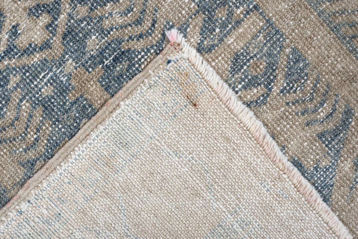 3' x 11' one-of-a-kind handmade antique Heriz runner rug. Color palette: ivory, pale blue, beige, taupe, camel, light blue