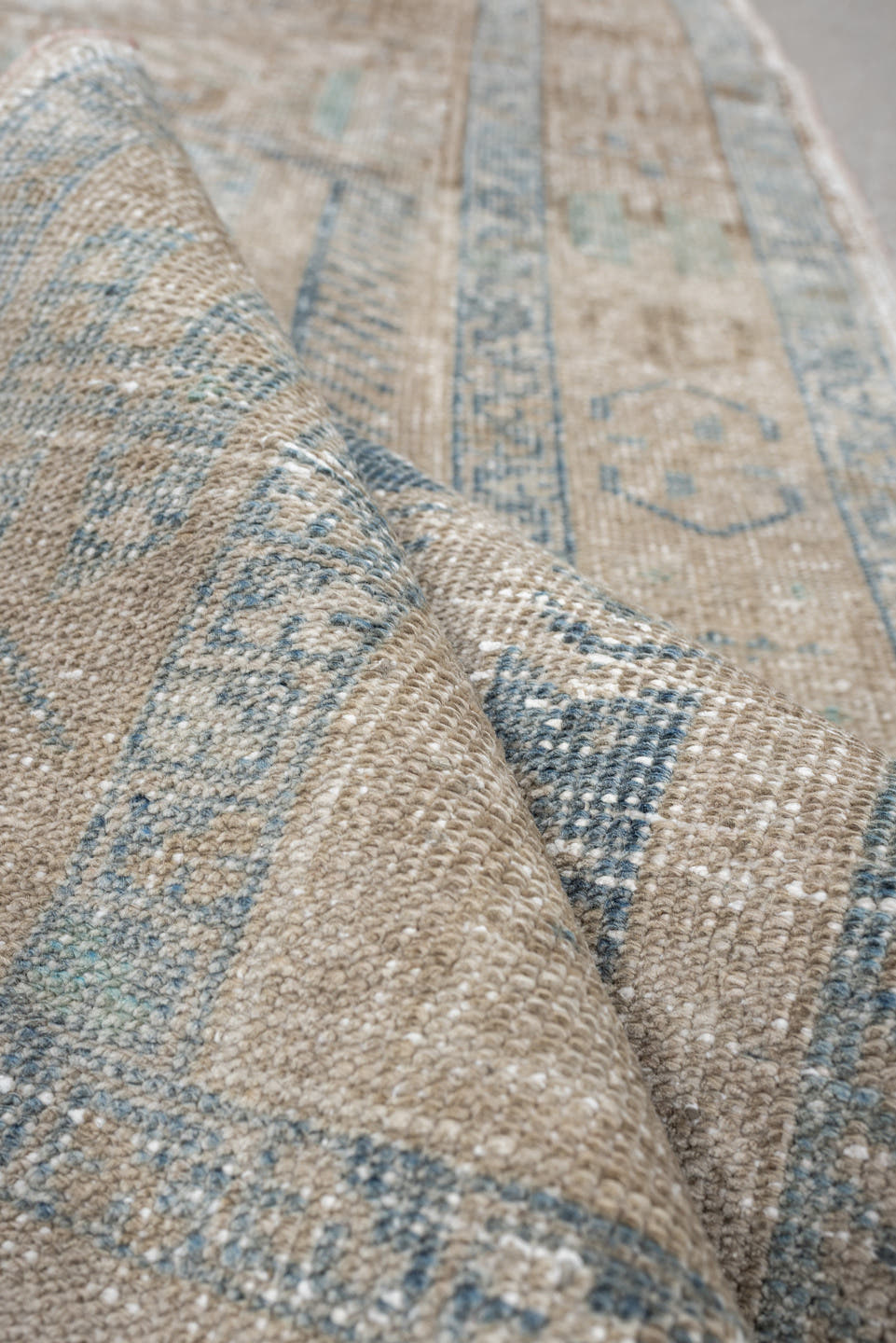 3' x 11' one-of-a-kind handmade antique Heriz runner rug. Color palette: ivory, pale blue, beige, taupe, camel, light blue