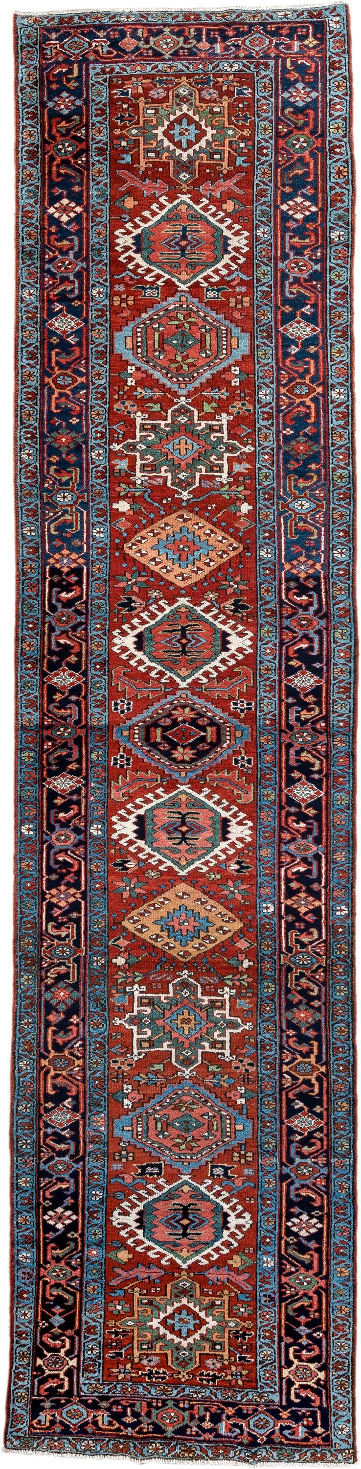 3' x 15' one-of-a-kind handmade antique Karaje runner rug. Color palette: rust, navy, teal, ivory, coral, light blue