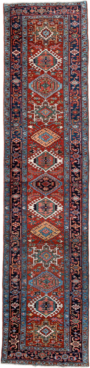 3' x 15' one-of-a-kind handmade antique Karaje runner rug. Color palette: rust, navy, teal, ivory, coral, light blue