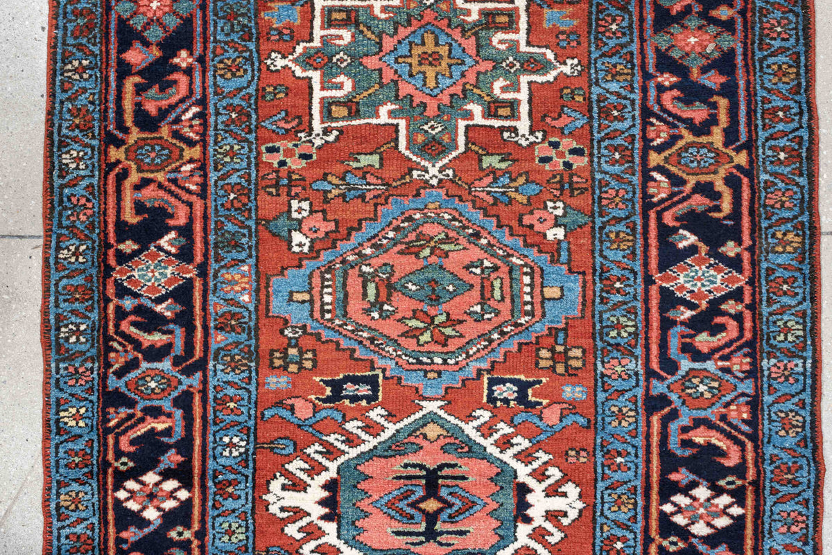 3' x 15' one-of-a-kind handmade antique Karaje runner rug. Color palette: rust, navy, teal, ivory, coral, light blue