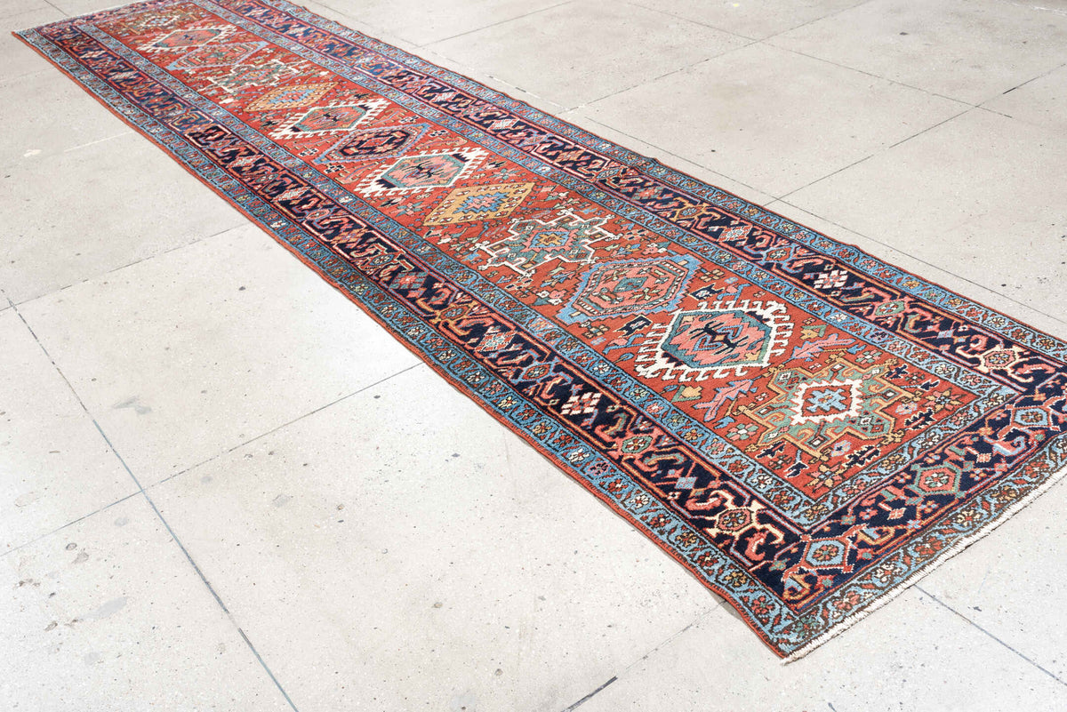 3' x 15' one-of-a-kind handmade antique Karaje runner rug. Color palette: rust, navy, teal, ivory, coral, light blue