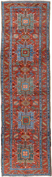 3' x 10' one-of-a-kind handmade antique Heriz runner rug. Color palette: rust, turquoise, sky blue, ivory, coral, navy, sage
