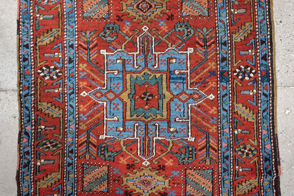 3' x 10' one-of-a-kind handmade antique Heriz runner rug. Color palette: rust, turquoise, sky blue, ivory, coral, navy, sage
