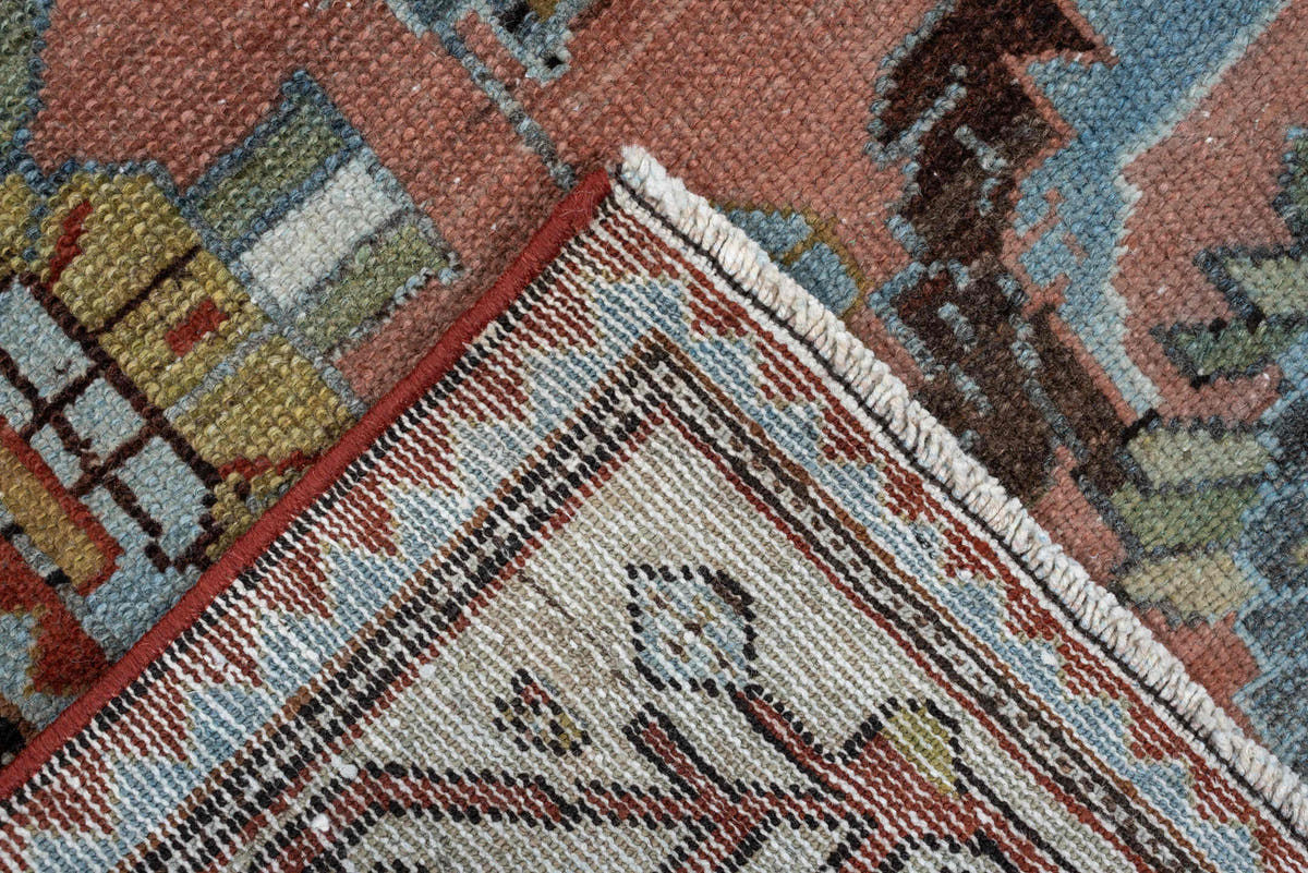 3' x 9' one-of-a-kind handmade antique Baktiary runner rug. Color palette: rose, ivory, pale blue, sage, rust, brown, taupe