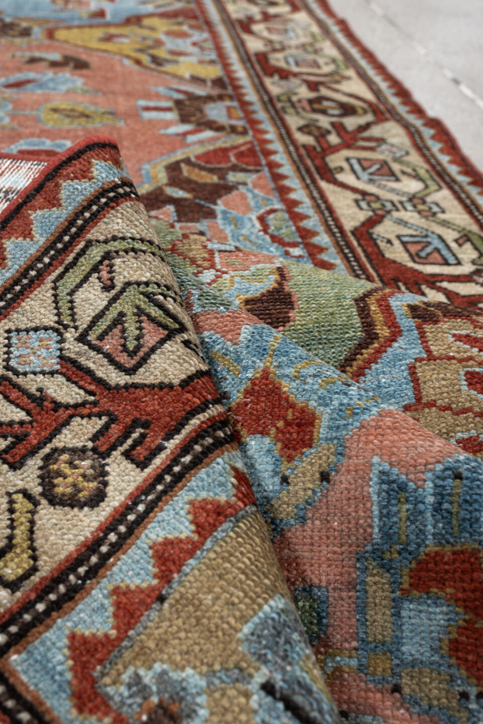 3' x 9' one-of-a-kind handmade antique Baktiary runner rug. Color palette: rose, ivory, pale blue, sage, rust, brown, taupe