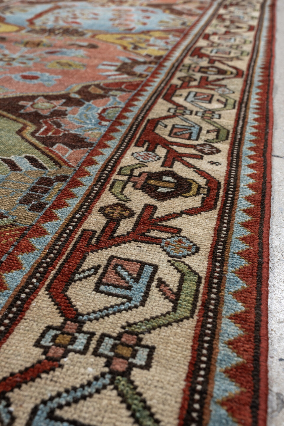3' x 9' one-of-a-kind handmade antique Baktiary runner rug. Color palette: rose, ivory, pale blue, sage, rust, brown, taupe