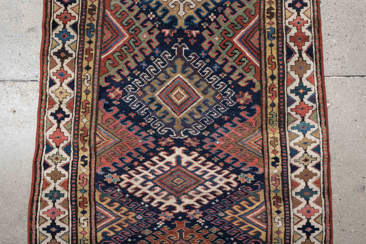 2' x 11' one-of-a-kind handmade antique NW Persian runner rug. Color palette: navy, ivory, rust, camel, terracotta