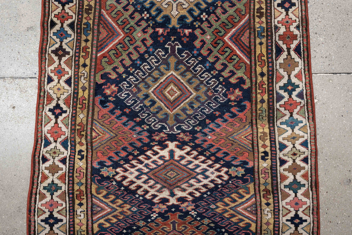 2' x 11' one-of-a-kind handmade antique NW Persian runner rug. Color palette: navy, ivory, rust, camel, terracotta
