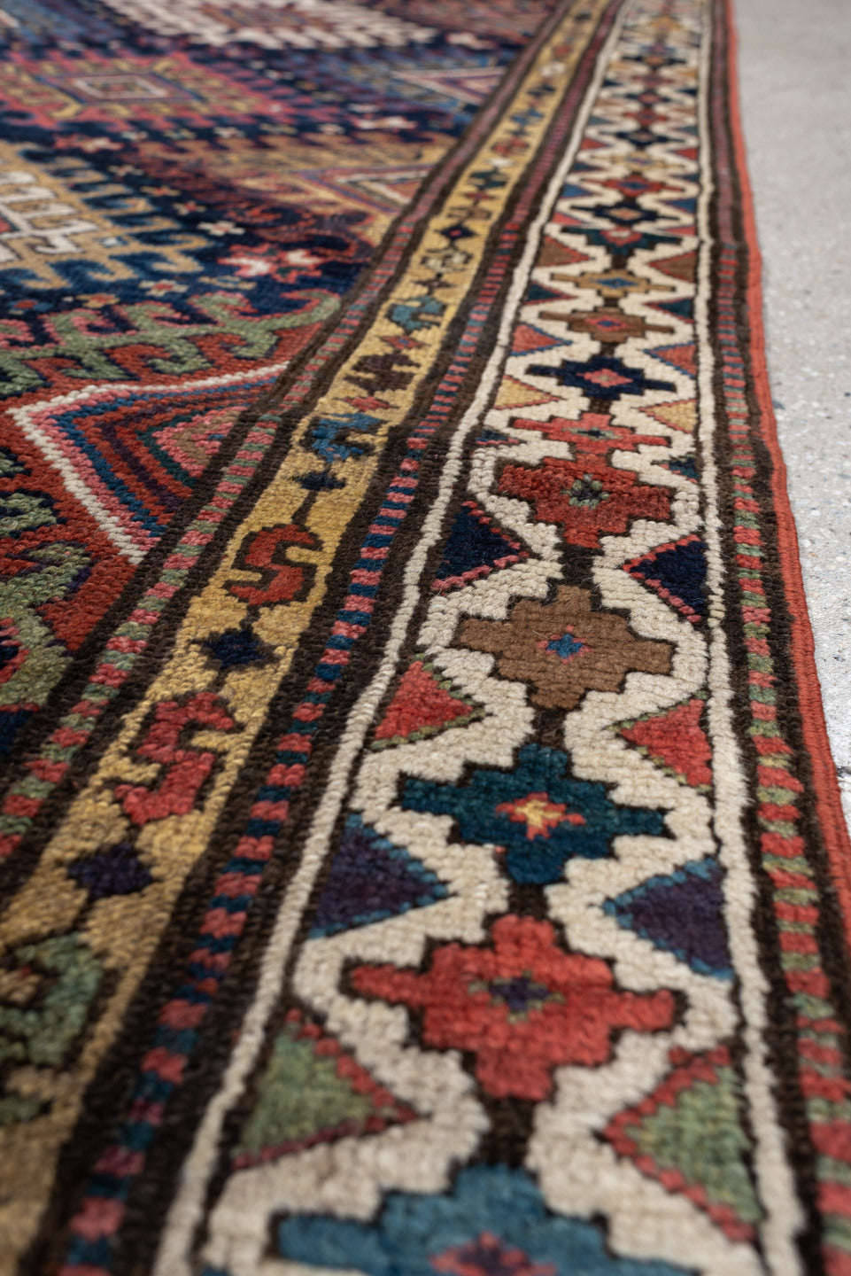 2' x 11' one-of-a-kind handmade antique NW Persian runner rug. Color palette: navy, ivory, rust, camel, terracotta